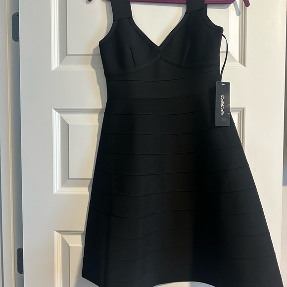 bebe Dresses & Skirts - Bebe Black Strappy Mini Dress